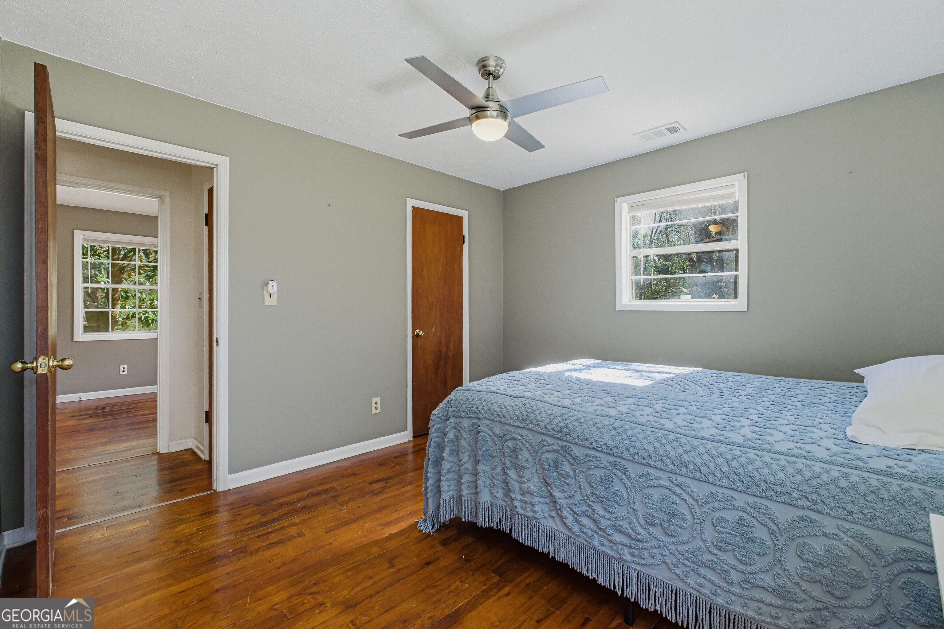 4124 Mangum Mill Road Gainesville, GA 30507 - Photo 26 of 48 a bedroom with bed and window