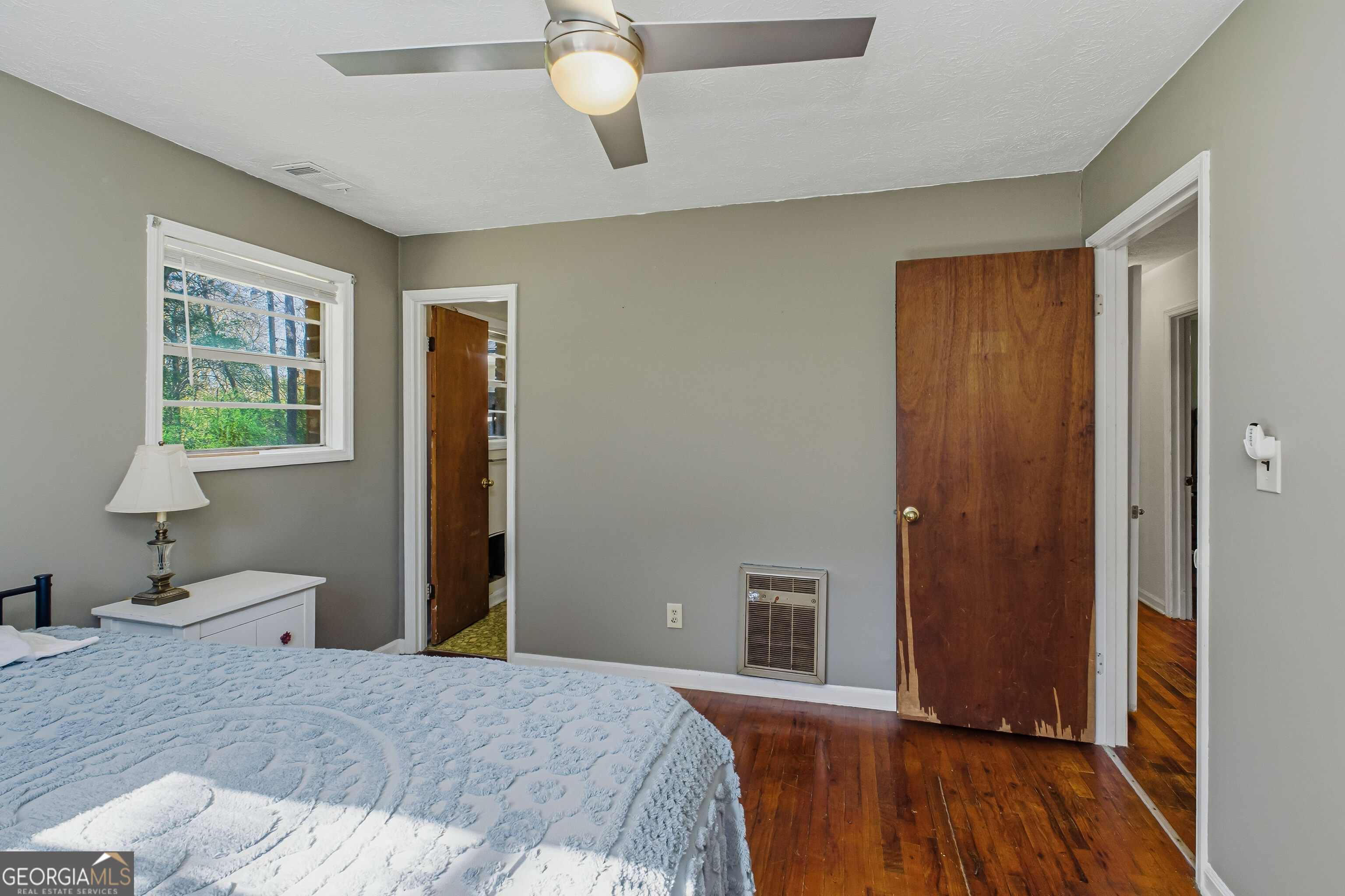 4124 Mangum Mill Road Gainesville, GA 30507 - Photo 28 of 48 a bedroom with a bed and a window