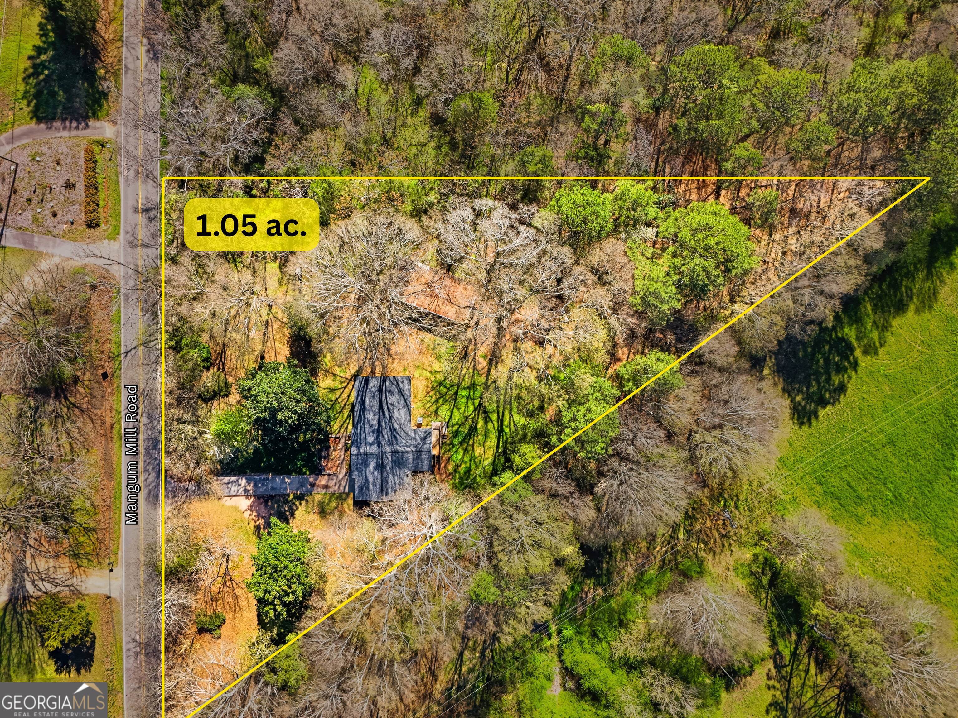 4124 Mangum Mill Road Gainesville, GA 30507 - Photo 47 of 48 a street sign that is on a small yard