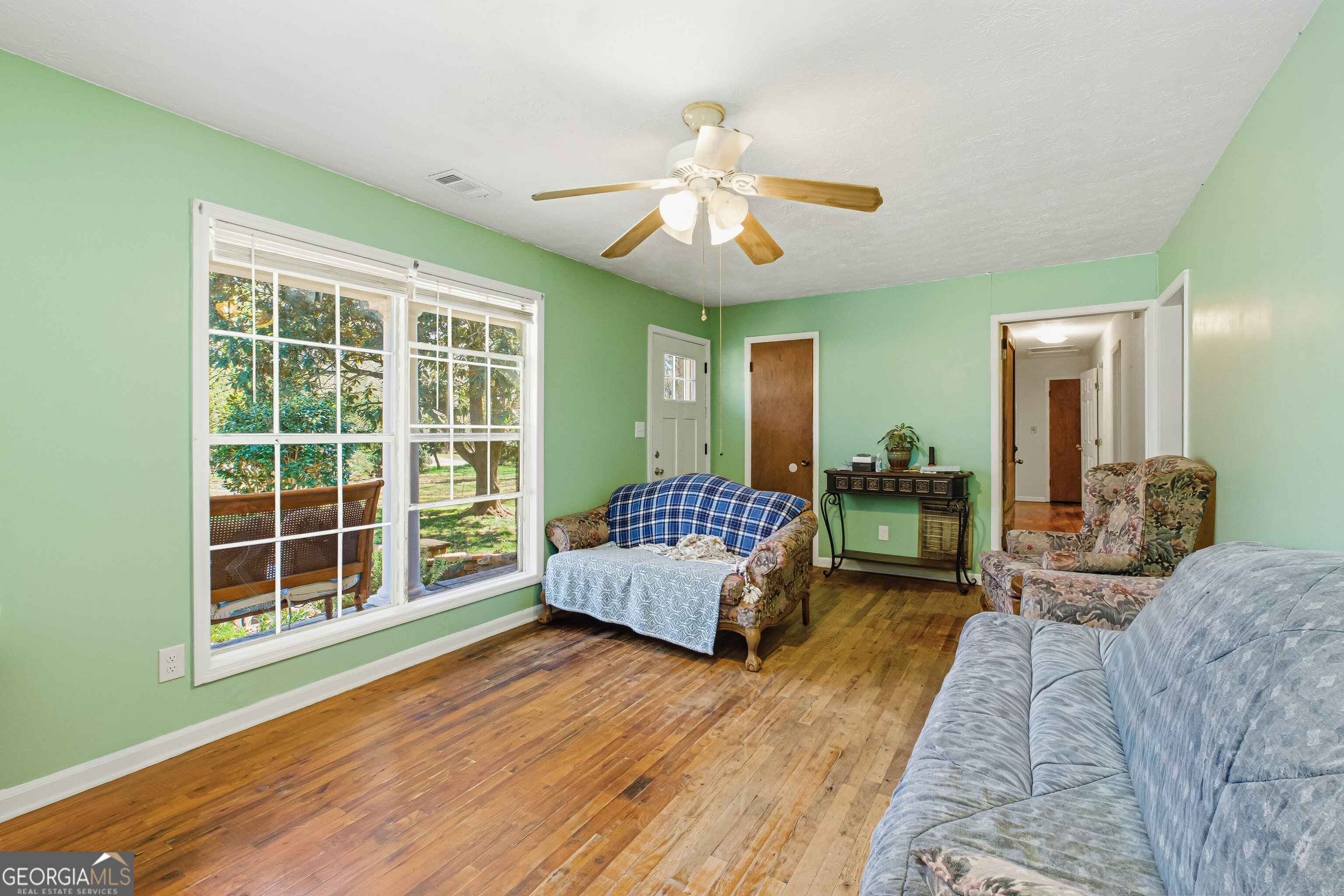 4124 Mangum Mill Road Gainesville, GA 30507 - Photo 6 of 48 a living room with furniture and a large window