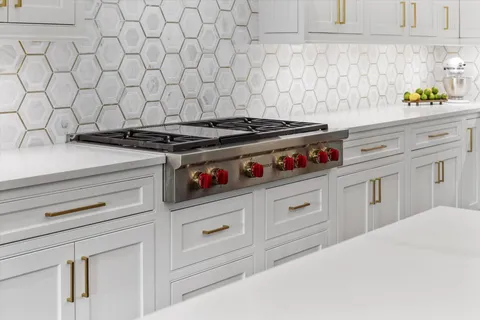 a kitchen with a refrigerator and window