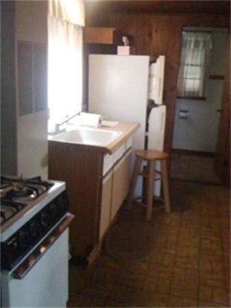 194 Ashby Road Ashburnham, MA 01430 - Photo 3 of 7 a kitchen that has a sink and a stove
