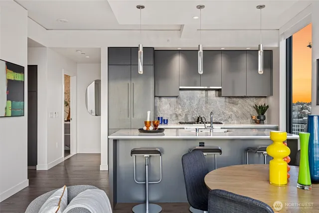 a kitchen with a sink and wooden cabinets