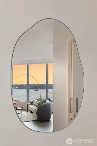 a view of a living room and floor to ceiling window