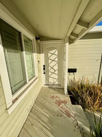 a front view of a house with a outdoor space