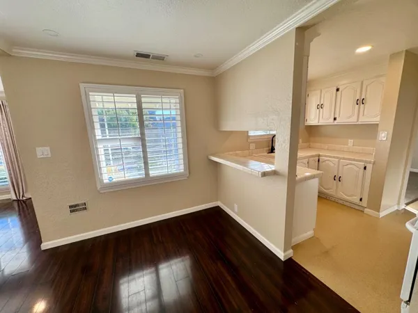 a room with window and wooden floor
