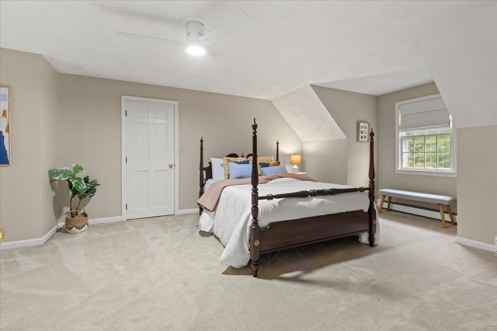 74 Granite Street Walpole, MA 02052 - Photo 25 of 40 a bedroom with a bed and a window
