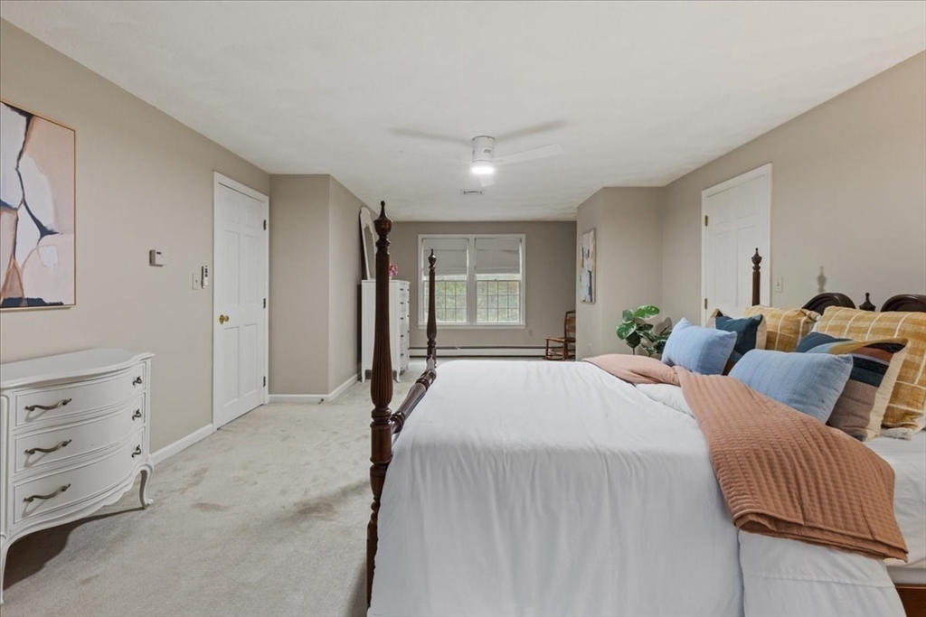 74 Granite Street Walpole, MA 02052 - Photo 26 of 40 a bedroom with a bed and window