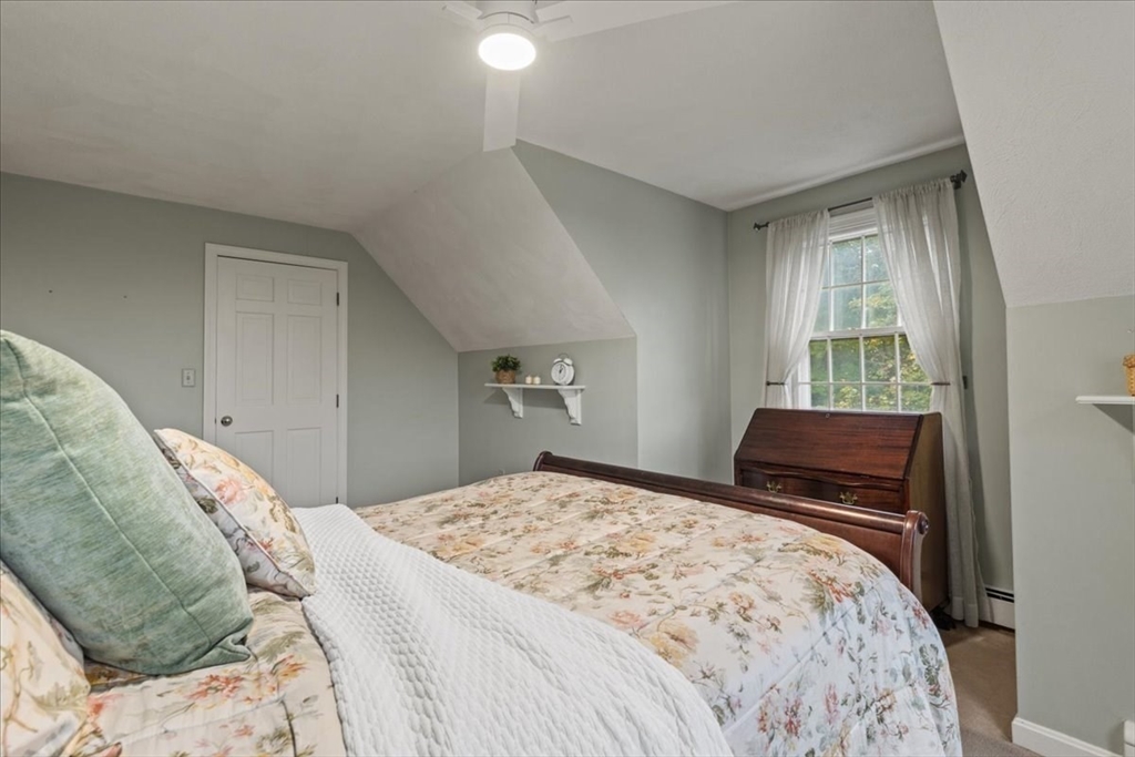 74 Granite Street Walpole, MA 02052 - Photo 28 of 40 a bedroom with a bed and a window
