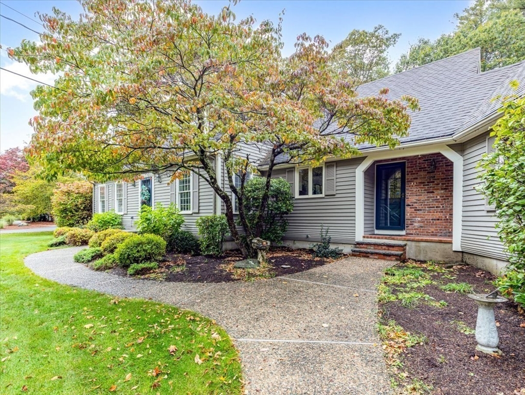 74 Granite Street Walpole, MA 02052 - Photo 3 of 40 a backyard of a house with outdoor seating