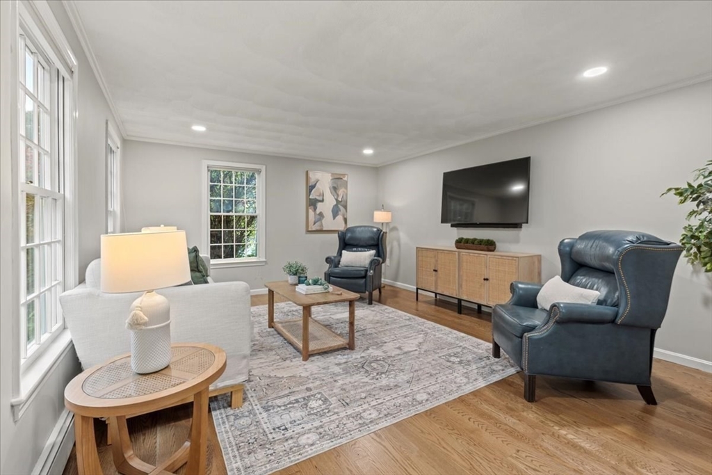 74 Granite Street Walpole, MA 02052 - Photo 5 of 40 a living room with furniture and a flat screen tv