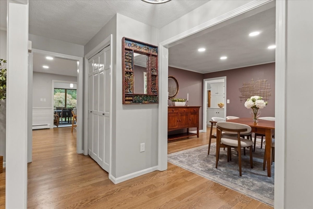 74 Granite Street Walpole, MA 02052 - Photo 7 of 40 a view of a livingroom with furniture and kitchen view
