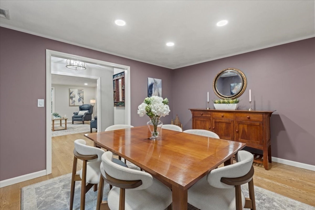 74 Granite Street Walpole, MA 02052 - Photo 8 of 40 a view of a dining room with furniture and wooden floor