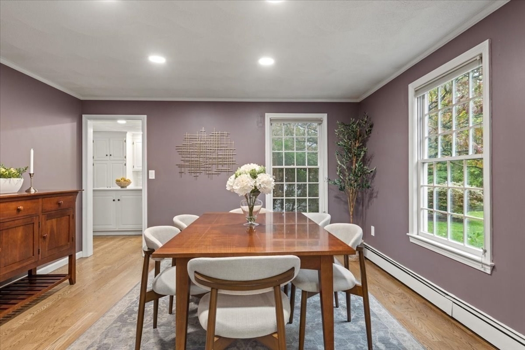 74 Granite Street Walpole, MA 02052 - Photo 9 of 40 a view of a dining room with furniture window and wooden floor