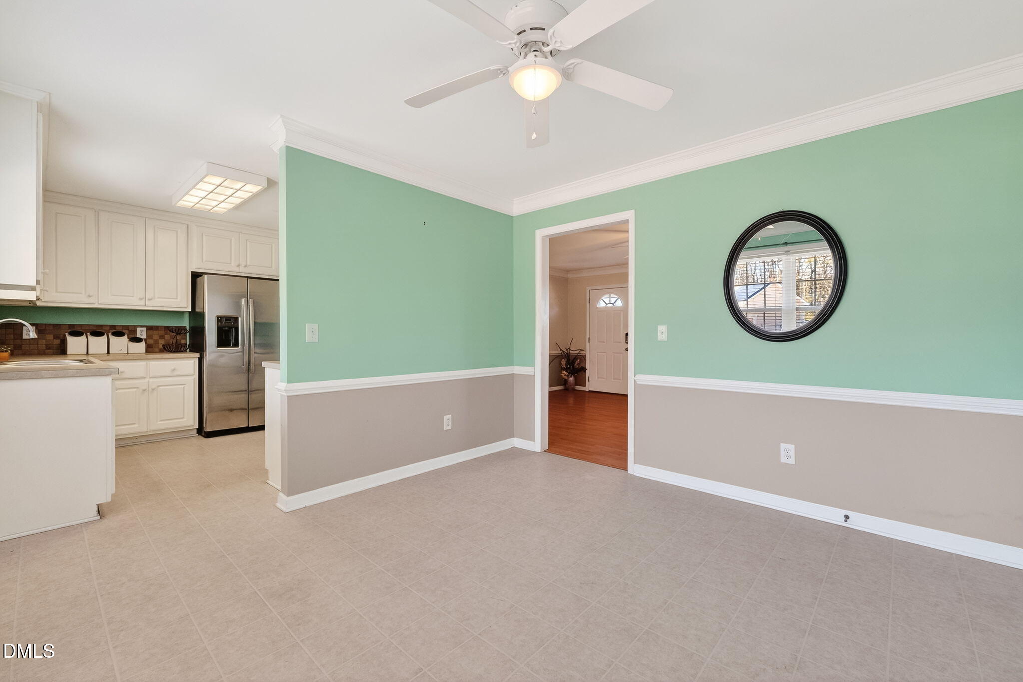 305 River Birch Run Coats, NC 27521 - Photo 14 of 36 a view of a kitchen with a fridge and dishwasher