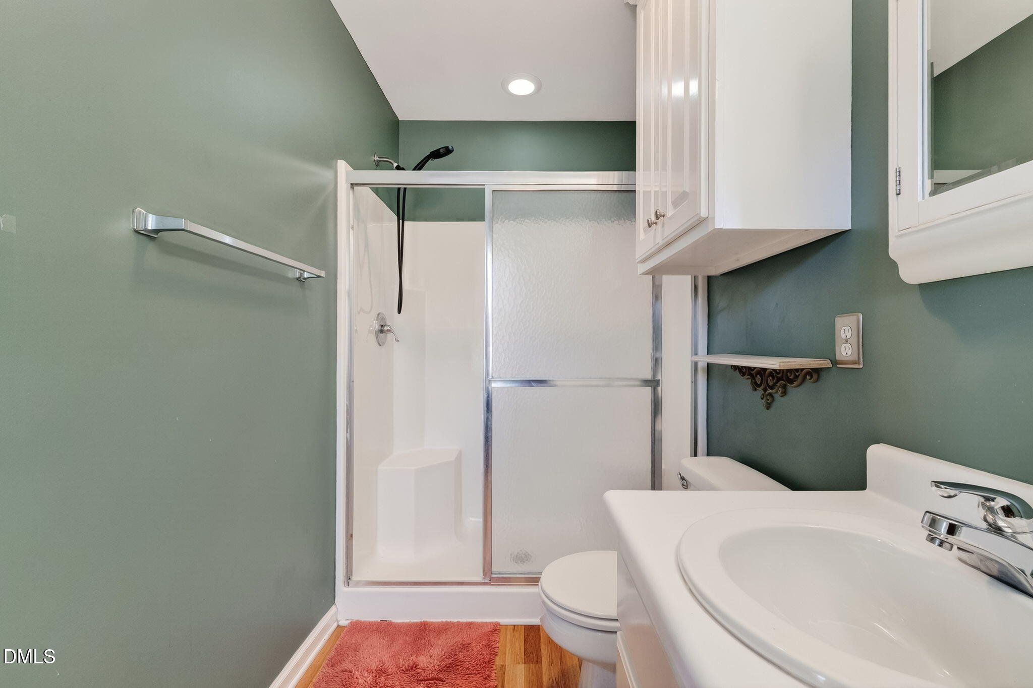305 River Birch Run Coats, NC 27521 - Photo 22 of 36 a bathroom with a sink a toilet and shower