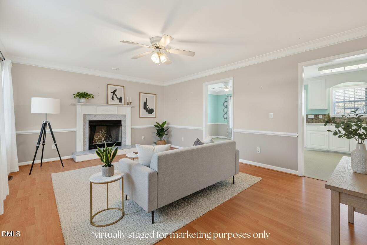 305 River Birch Run Coats, NC 27521 - Photo 5 of 36 a living room with furniture and a fireplace