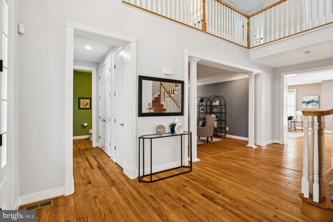 41881 Redgate Way Ashburn, VA 20148 - Photo 25 of 60 Hallway to Living Room & Half Bathroom