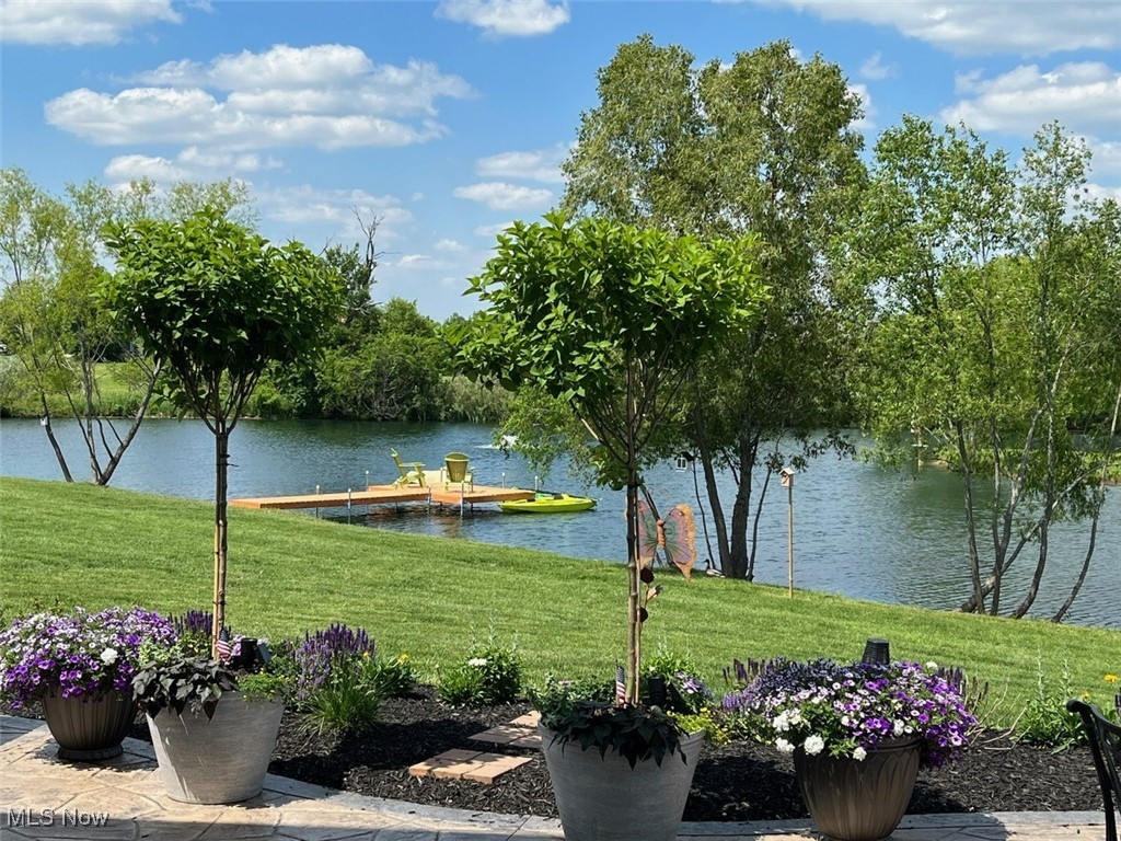 4437 Beach Road Medina, OH 44256 - Photo 49 of 50 View of yard featuring a water view and a boat dock