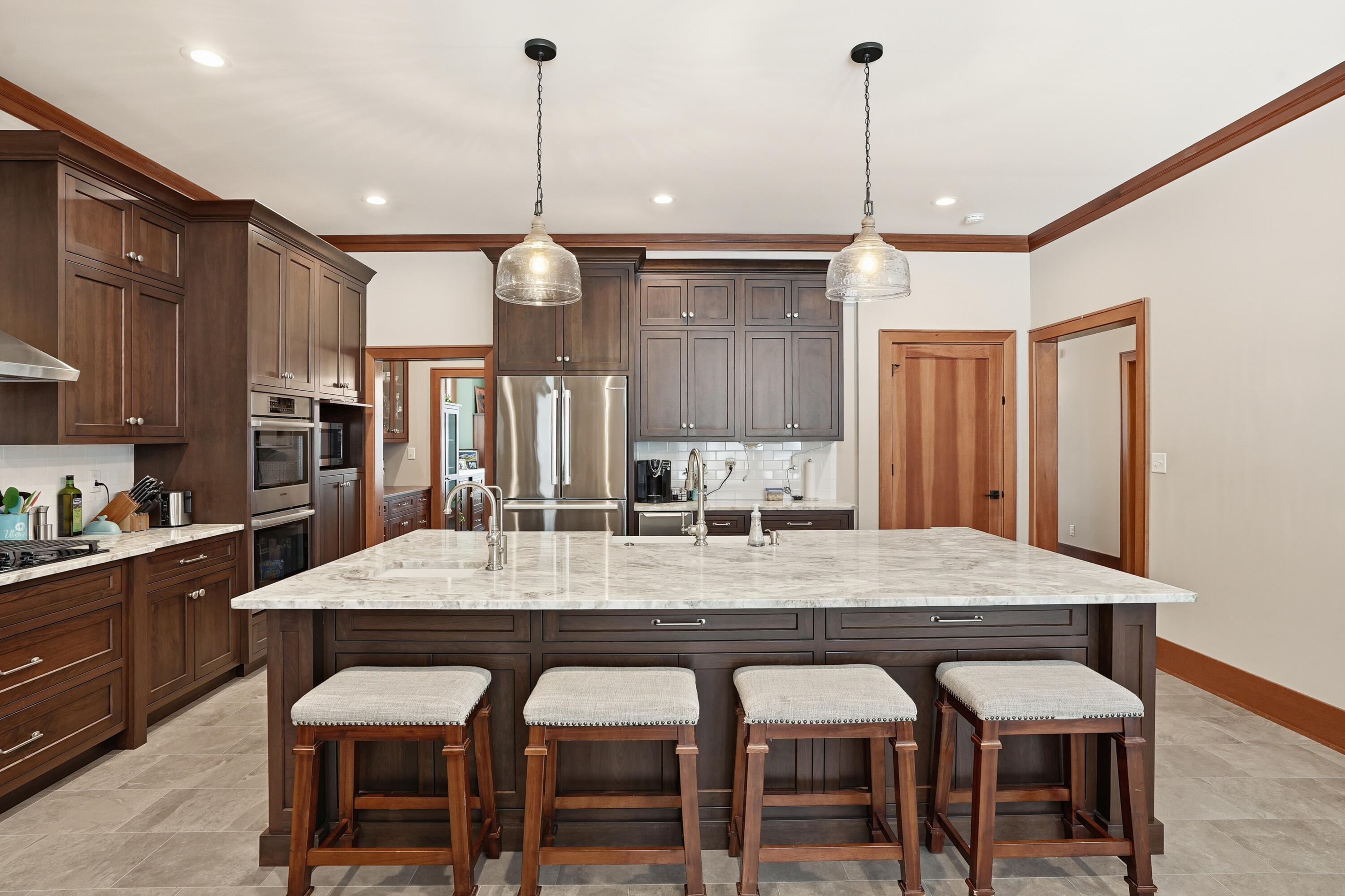804 Shannon Drive Crown Point, IN 46307 - Photo 24 of 79 a dining table with chairs and kitchen view
