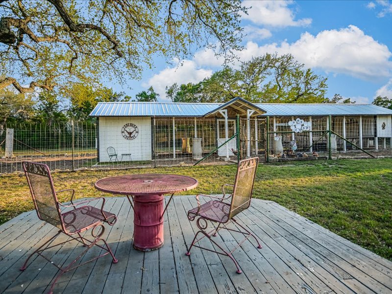 14036 Timberline Trail Austin, TX 78737 - Photo 31 of 40 View of wooden deck that overlooks backyard sport court, nature trail and chicken coop.