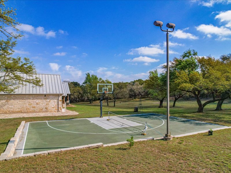 14036 Timberline Trail Austin, TX 78737 - Photo 32 of 40 Sport Court can be used for basketball, pickleball, badminton.