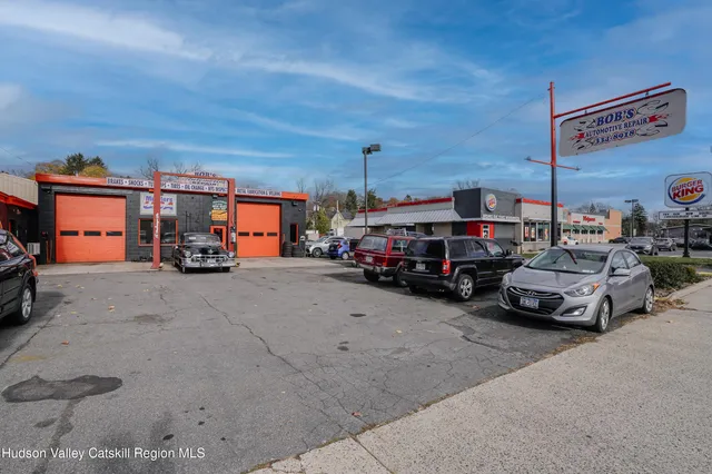 a car parked in front of garage