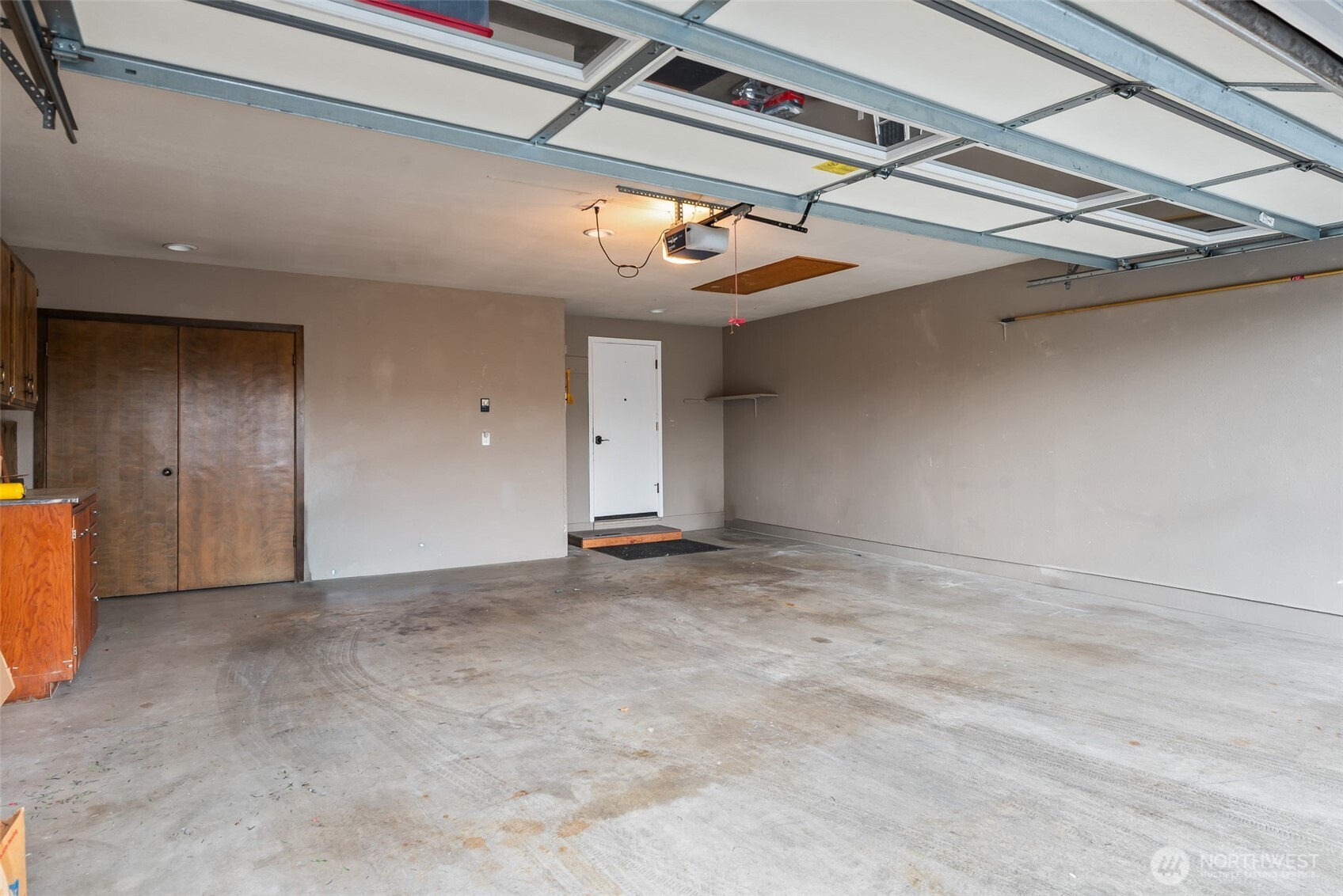 1310 Castlerock Avenue, Unit 19 Wenatchee, WA 98801 - Photo 14 of 17 a view of a garage