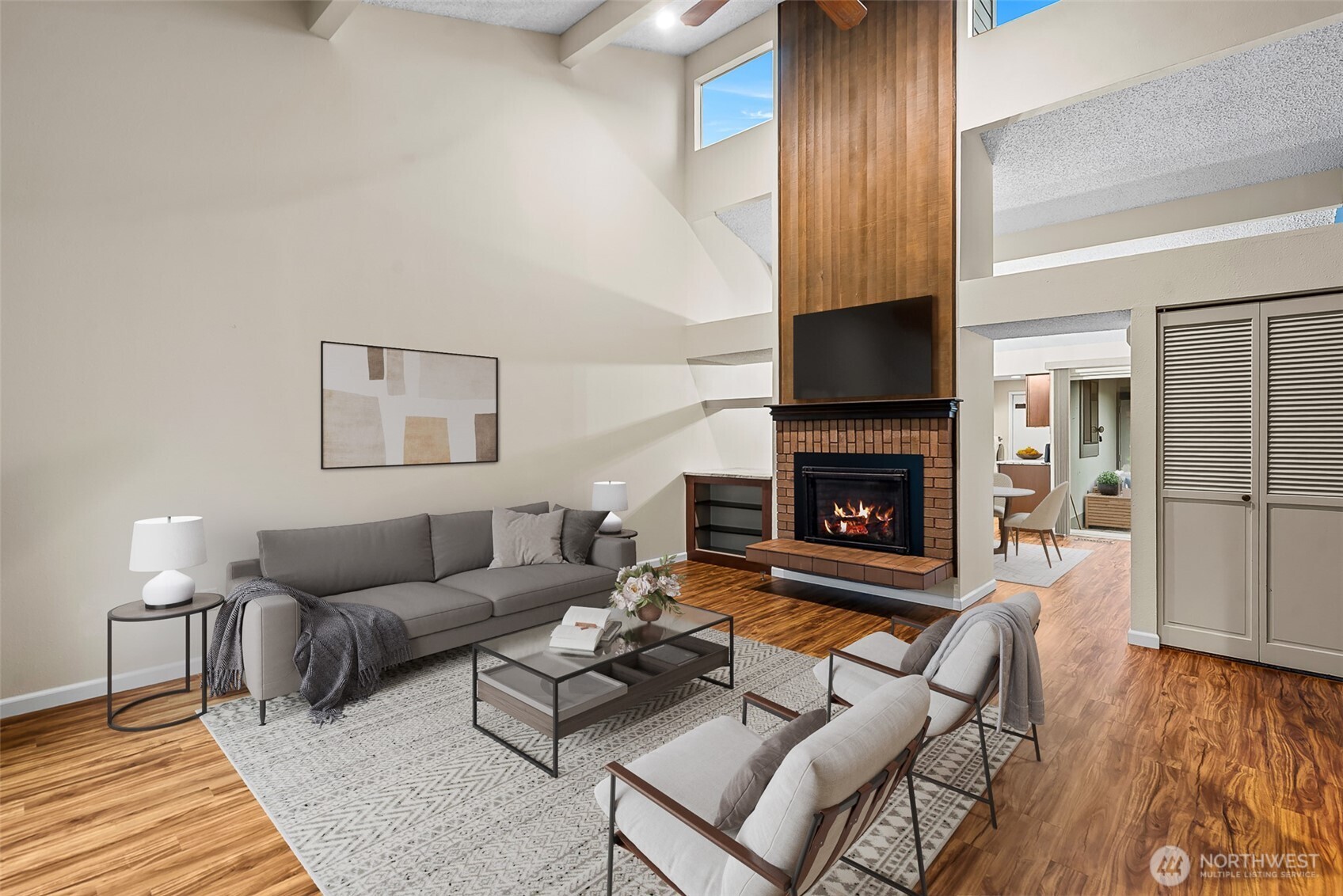 1310 Castlerock Avenue, Unit 19 Wenatchee, WA 98801 - Photo 3 of 17 a living room with furniture and a fireplace