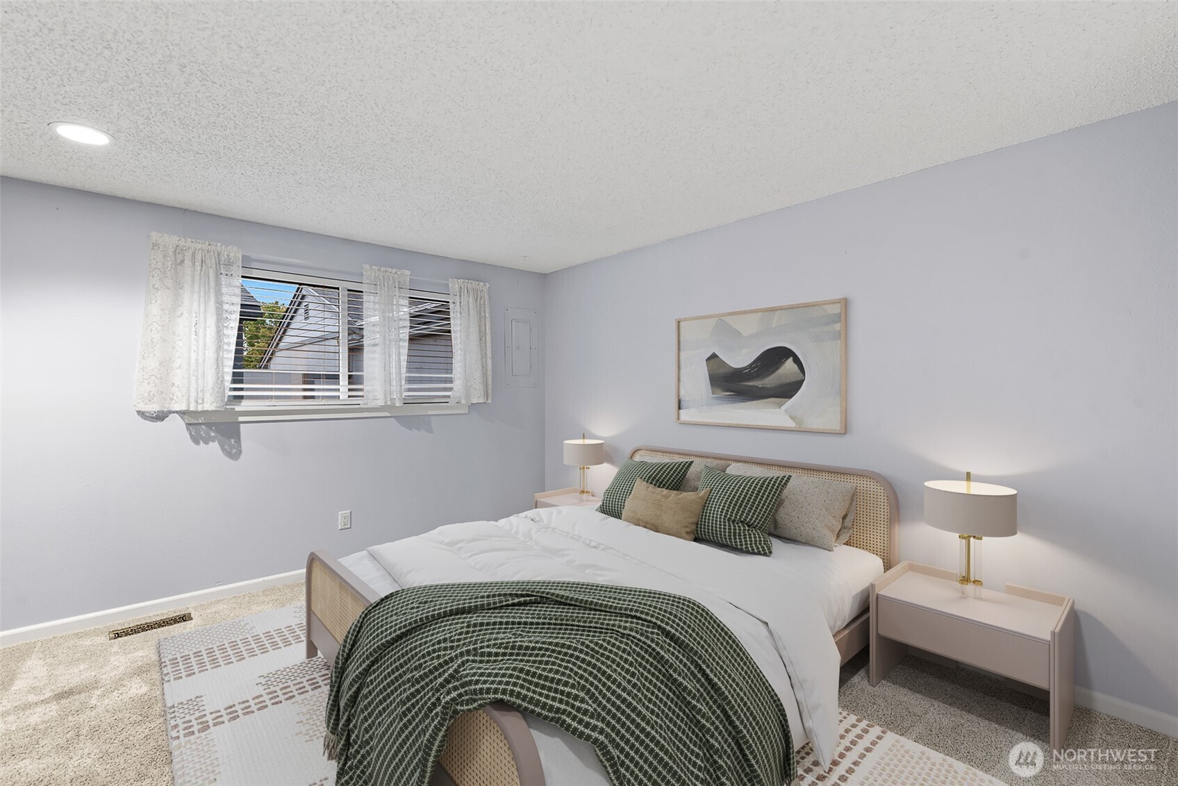 1310 Castlerock Avenue, Unit 19 Wenatchee, WA 98801 - Photo 6 of 17 a bedroom with a bed and a painting on the wall