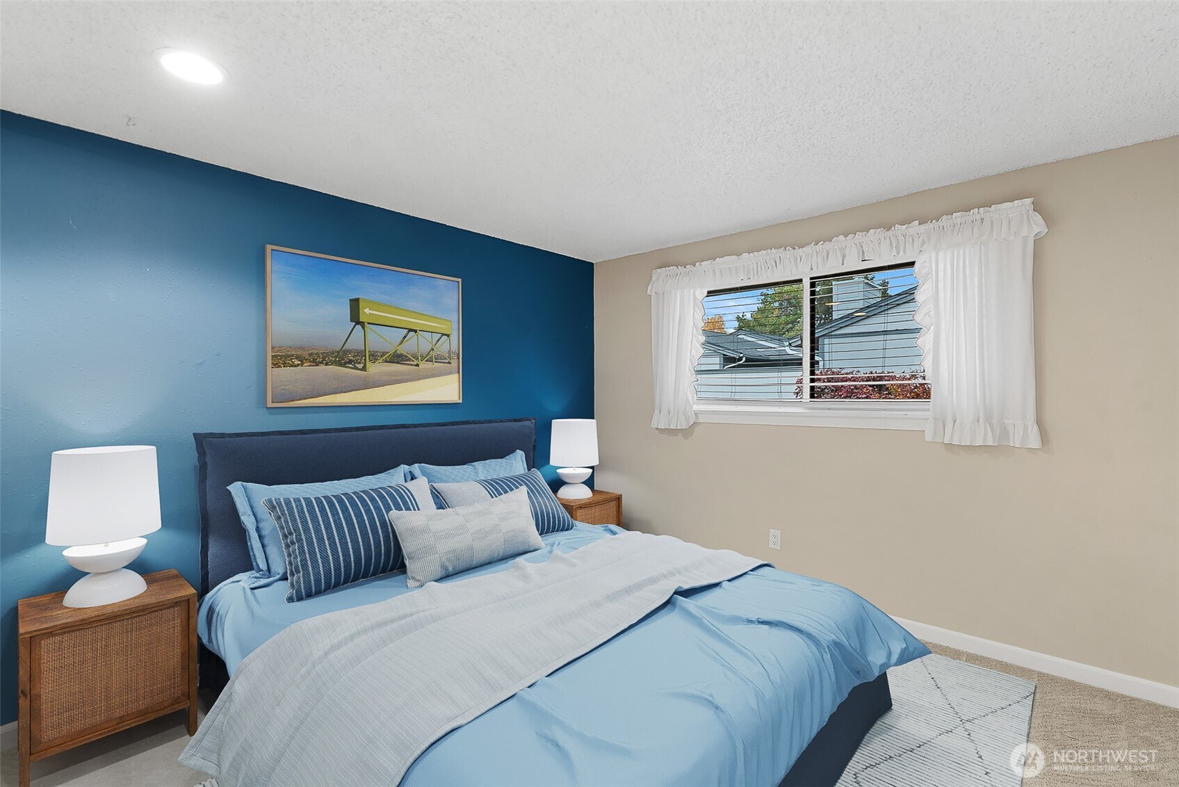 1310 Castlerock Avenue, Unit 19 Wenatchee, WA 98801 - Photo 10 of 17 a bedroom with bed and night stand
