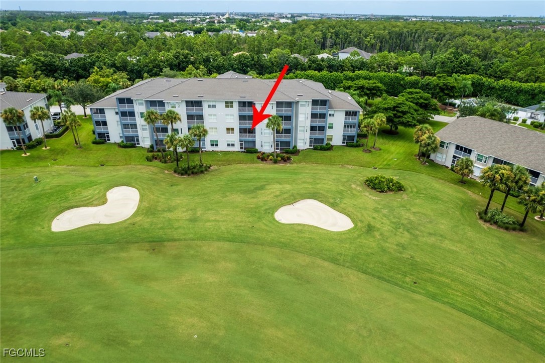 10275 Bismark Palm Way, Unit 1124 Fort Myers, FL 33966 - Photo 2 of 50 a view of a house with backyard