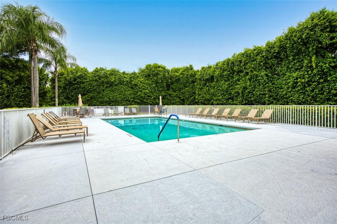 10275 Bismark Palm Way, Unit 1124 Fort Myers, FL 33966 - Photo 48 of 50 a view of outdoor space with seating area