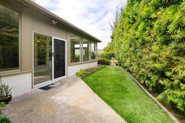 a view of a back yard of the house