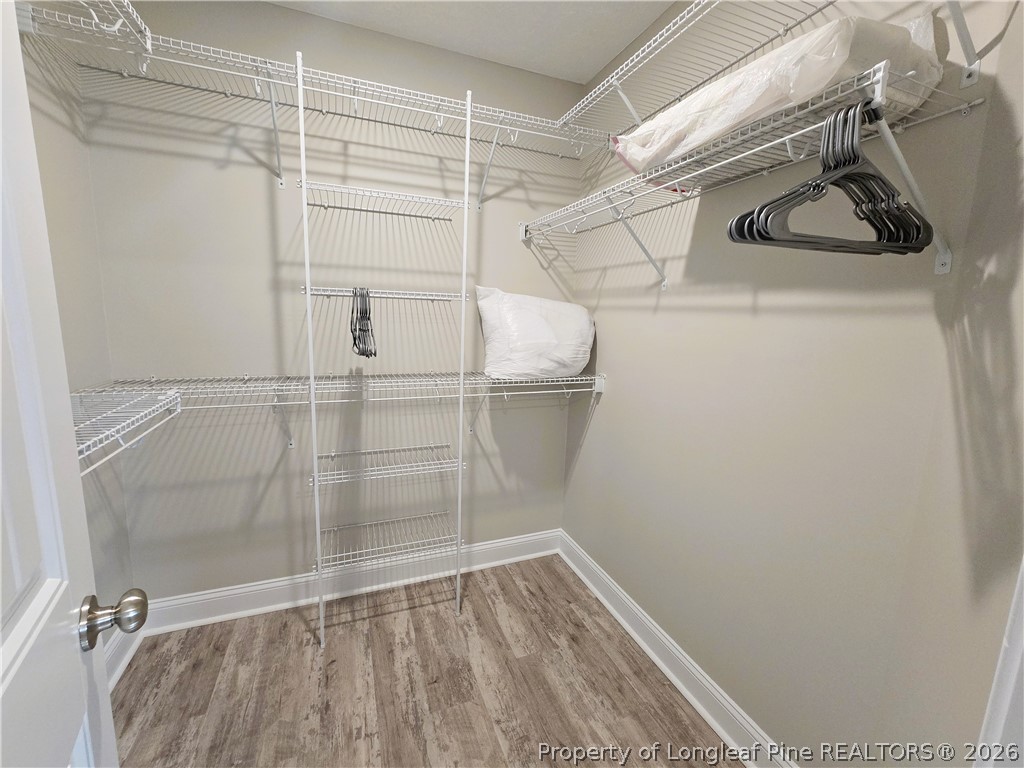422 Mitchell Farm Road Goldsboro, NC 27530 - Photo 25 of 28 a view of a room with racks on the wall