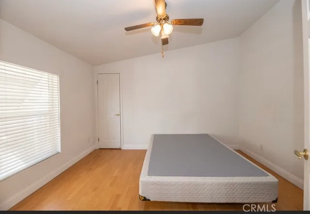 a view of a room with ceiling fan