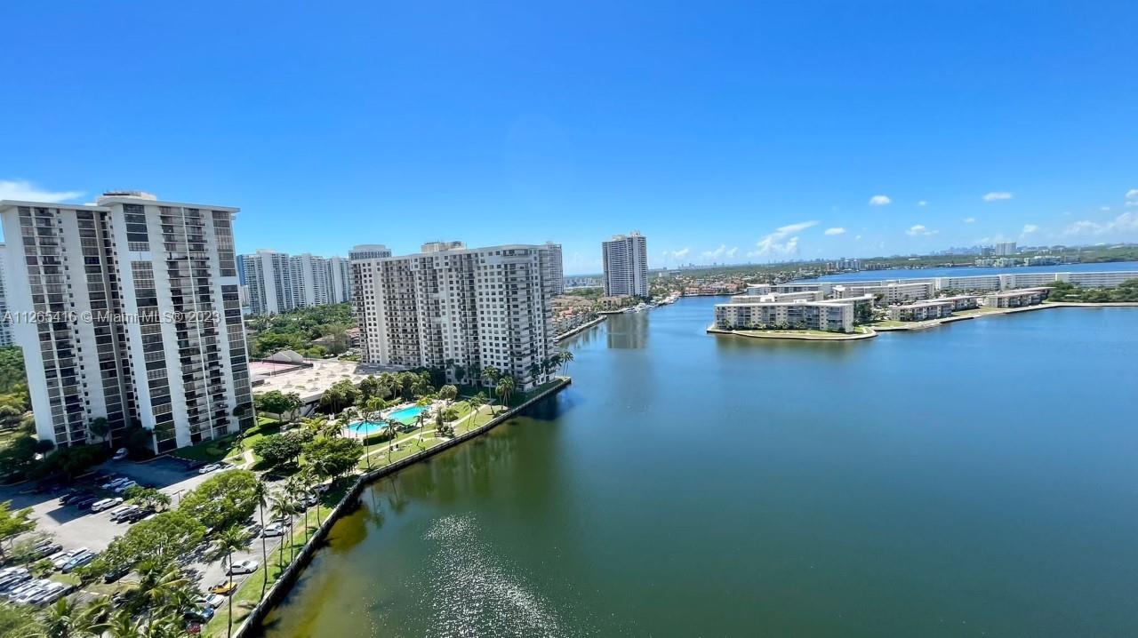 a view of a city with tall buildings