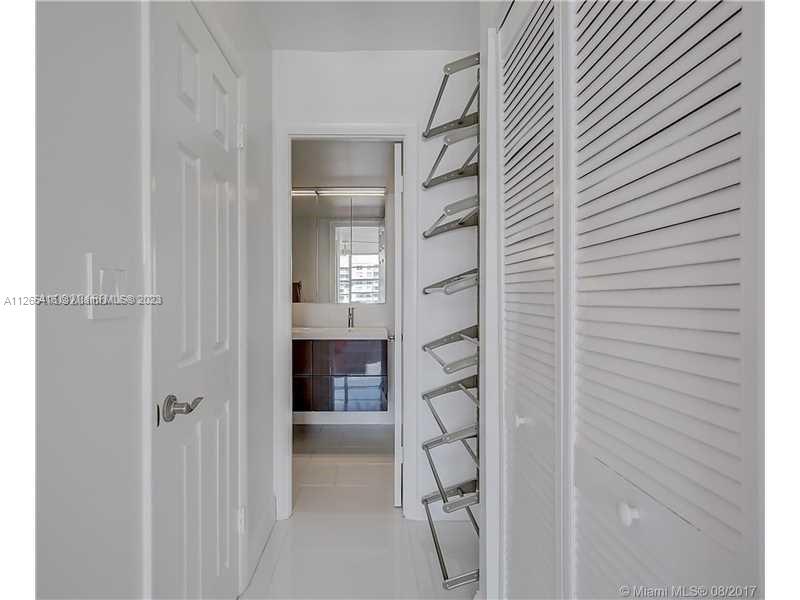 2851 Northeast 183rd Street, Unit 1816E Aventura, FL 33160 - Photo 20 of 29 a view of a hallway with a room