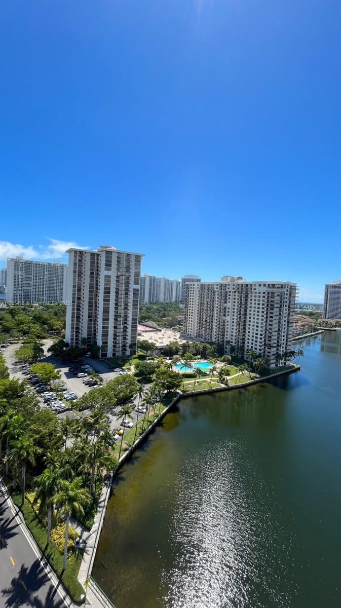 2851 Northeast 183rd Street, Unit 1816E Aventura, FL 33160 - Photo 26 of 29 a view of swimming pool from a lake
