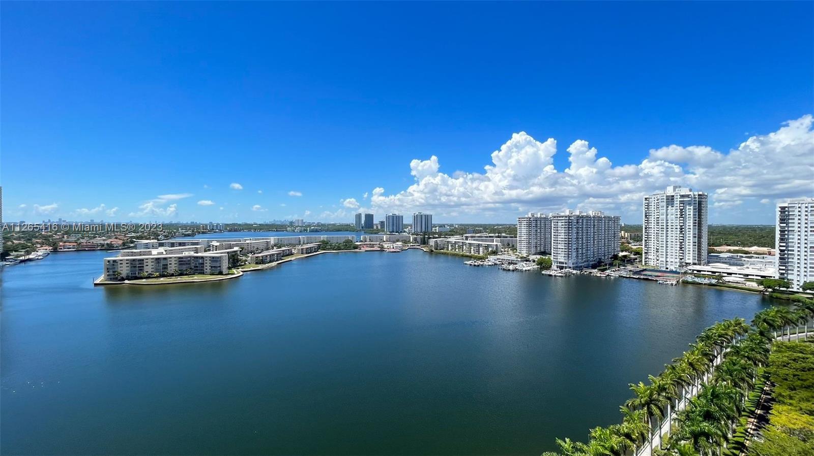 2851 Northeast 183rd Street, Unit 1816E Aventura, FL 33160 - Photo 27 of 29 a view of a water with sitting area