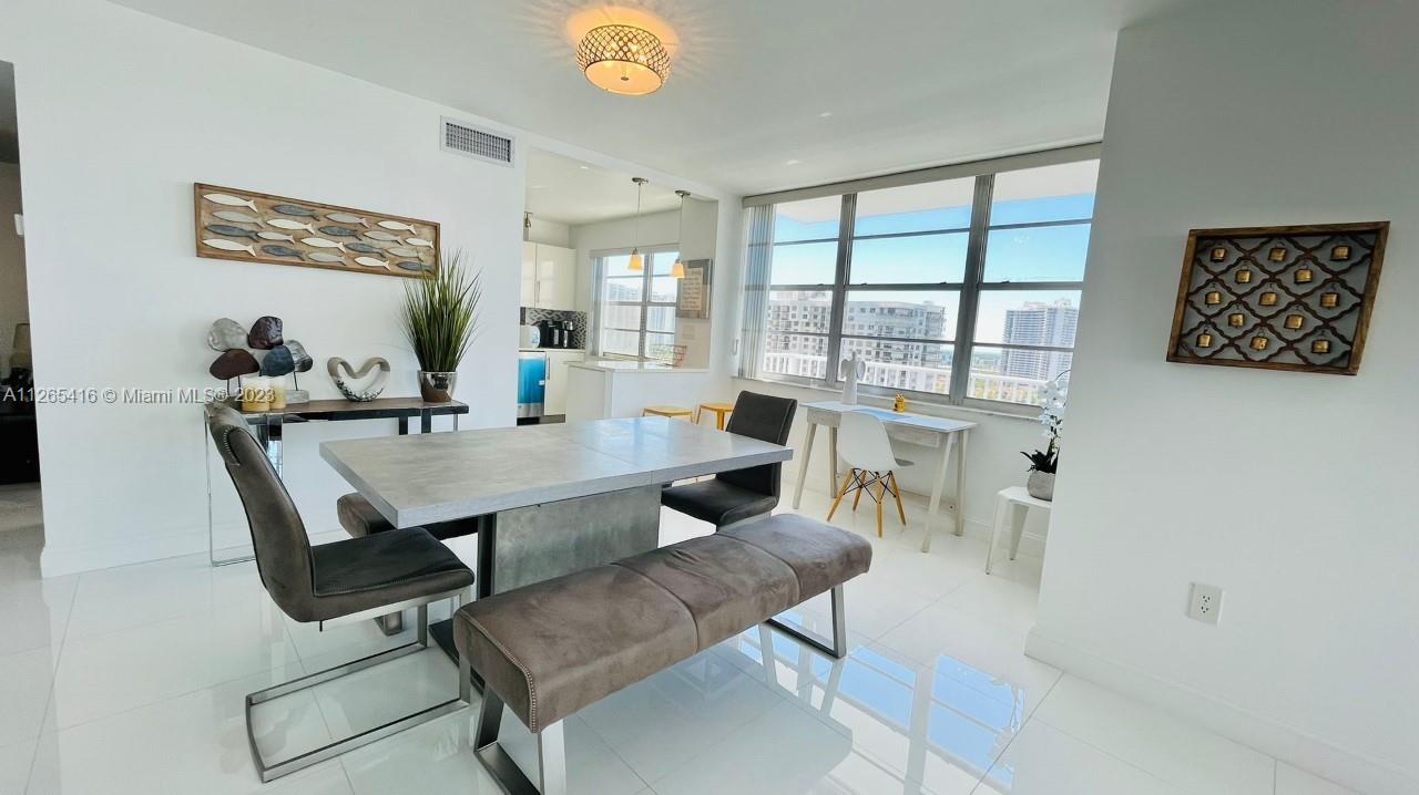 2851 Northeast 183rd Street, Unit 1816E Aventura, FL 33160 - Photo 8 of 29 a view of a workspace with furniture