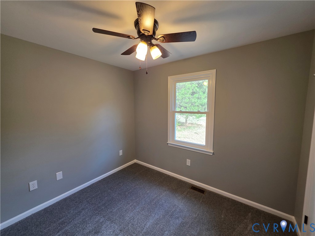 7613 Squirrel Level Road Petersburg, VA 23805 - Photo 29 of 30 Neutral-toned wall finish, white window trim, grey