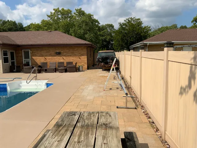 a patio with table and chairs