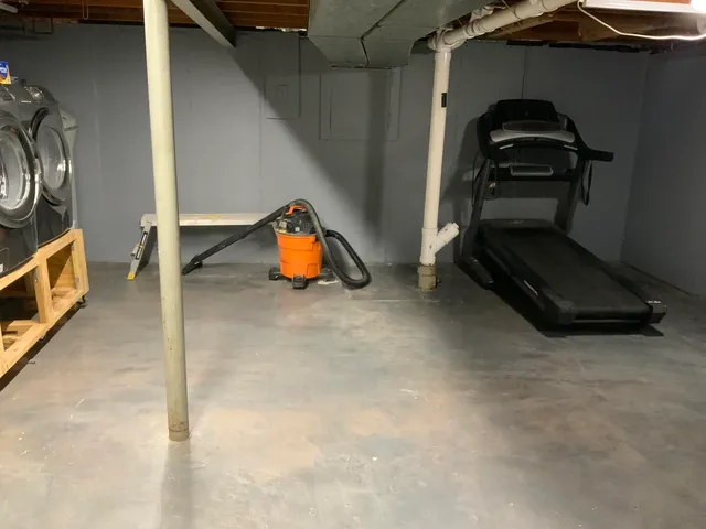 a utility room with dryer and washer