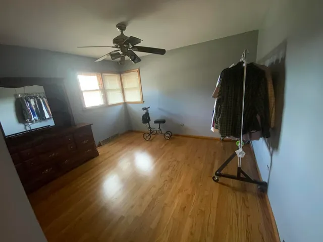 a bathroom with a sink toilet and a mirror