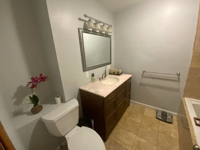 a bathroom with a sink and a vanity
