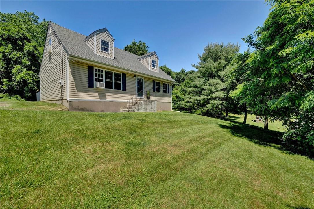286 New Hempstead Road New City, NY 10956 - Photo 1 of 1 a front view of house with yard and green space