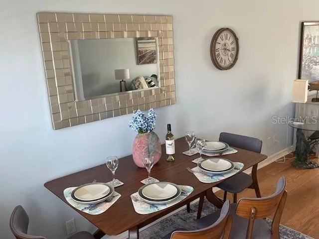 a table and a vase sitting on a table