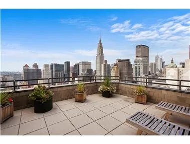 a view of a living room and dining room
