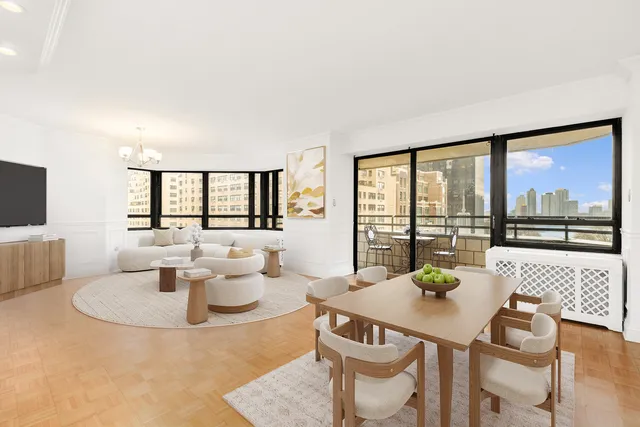 wooden floor in an empty room with a large window